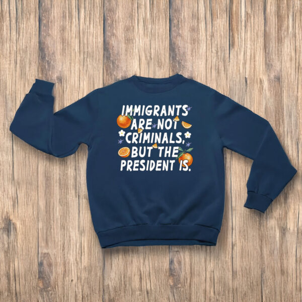 Anti-Trump-Shirt,-Imigrants-Are-Not-Criminals-But-The-President-Shirt-us